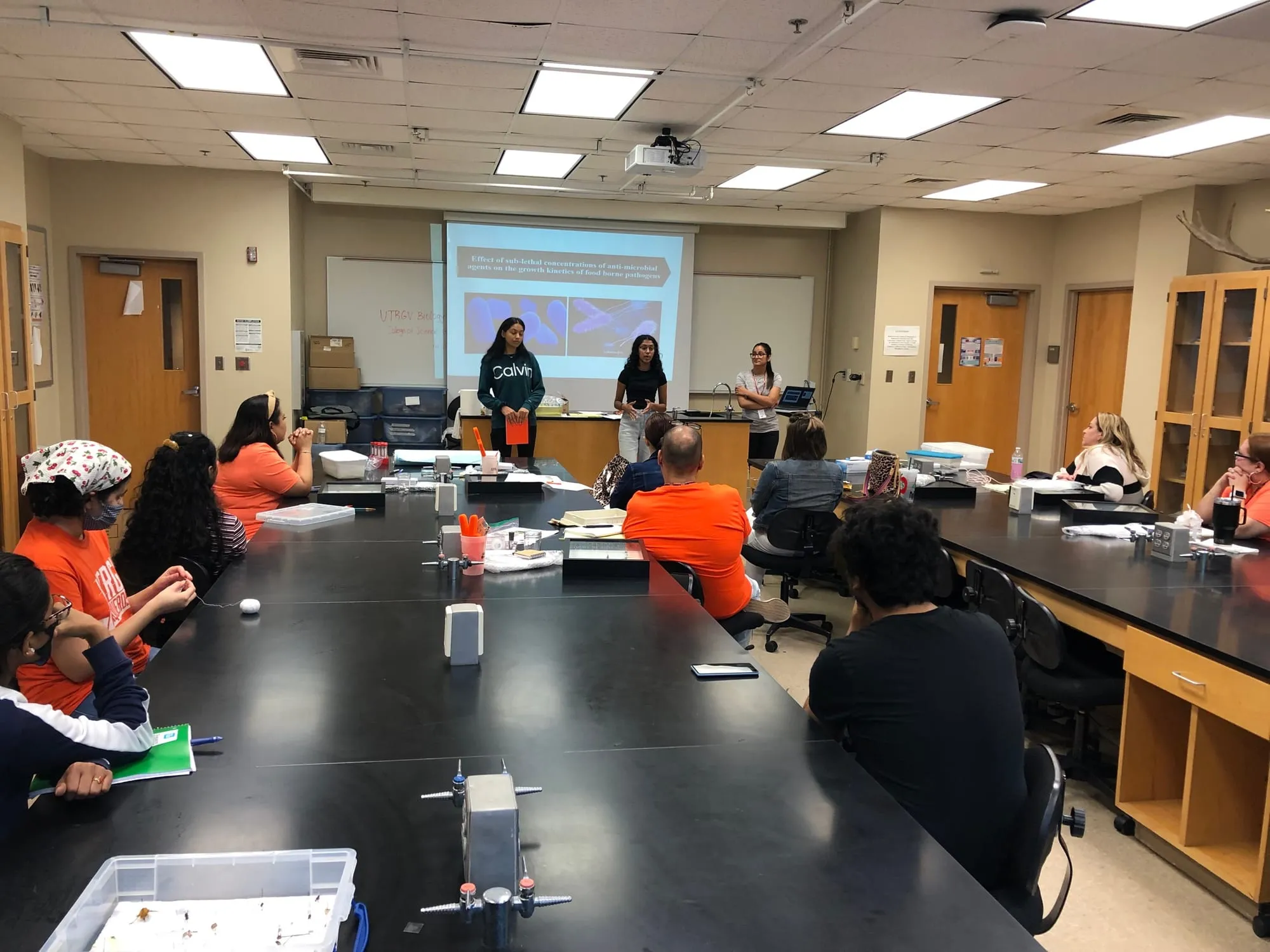 Students seated at lab benches during a class session
